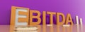 EBITDA word built with letter and stacked coins. 3d illustration Royalty Free Stock Photo