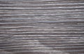 Ebon wood, natural dark wood surface with white stripes close-up