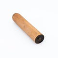 Ebonite stick on white background, cross cut. Also is known as hard rubber or vulcanite