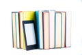 Ebook among paper books. new technology concept Royalty Free Stock Photo