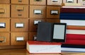 Ebook Reader in Front Library Catalogue - New Technology Concept Royalty Free Stock Photo