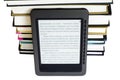 Ebook reader on pile books Royalty Free Stock Photo