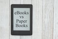 Ebooks vs paper books message on an e-reader screen