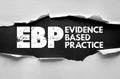 EBP EVIDENCE BASED PRACTICE text under torn paper, signifying clinical research, data-driven healthcare, and professional decision Royalty Free Stock Photo