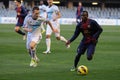 Ebwelle (right) plays with F.C. Barcelona youth team against Todd Kane (left)