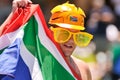 Eccentric fan with South African garb at live sports event