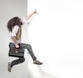 Eccentric man pointng on the empty board