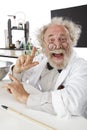 Eccentric scientist in lab excited about ideas