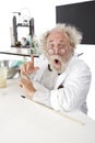 Eccentric scientist in lab gestures excitedly