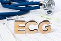 ECG Acronym or abbreviation to medical dignostics of electrocardiogram - cardiac test that measures electrical impulses in heart.