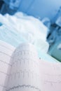ECG printout near of patients bed Royalty Free Stock Photo