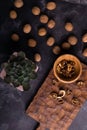 Echeveria plant and walnuts on blue slate table. Healthy nuts and seeds composition. Royalty Free Stock Photo