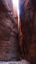 Echidna Chasm rock slot canyon with high walls within the Bungle Bungle Mountain Range of Purnululu National Park in Western Austr Royalty Free Stock Photo