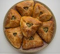 Echpochmak - meat pies, potatoes and greens.