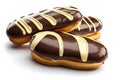 eclair cake with dark chocolate icing insulated on a white background Royalty Free Stock Photo