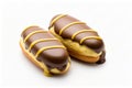 eclair cake with dark chocolate icing insulated on a white background Royalty Free Stock Photo