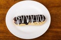 Eclair with White Icing Royalty Free Stock Photo