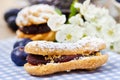 Eclairs with blueberry marmalade Royalty Free Stock Photo