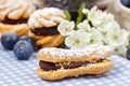 Eclairs with blueberry marmalade Royalty Free Stock Photo