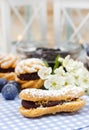 Eclairs with blueberry marmalade Royalty Free Stock Photo