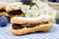 Eclairs with blueberry marmalade Royalty Free Stock Photo