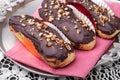 Eclairs cakes with chocolate glaze Royalty Free Stock Photo
