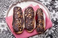 Eclairs cakes with chocolate glaze Royalty Free Stock Photo