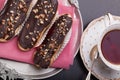Eclairs cakes with chocolate glaze Royalty Free Stock Photo