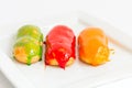 Eclairs with colorful caramel glaze