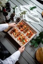 Eclairs with salmon, fresh vegetables and herbs, gourmet snacks.