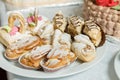 Eclairs sweets with cream sprinkled sugar powder