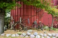 Outdoor Lawn Ornaments Against a Silo