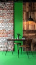 Eclectic Modern Workspace with Green Wall Royalty Free Stock Photo