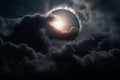 An eclipse with clouds intermittently blocking the light in the atmospheric surroundings Royalty Free Stock Photo