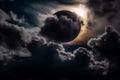 Eclipse with clouds intermittently blocking the light, casting mesmerizing shadows in the atmospheric surroundings Royalty Free Stock Photo