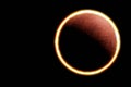 Eclipse of the sun in the annular phase when the moon aligns between the earth and the sun forming the corona or ring of fire Royalty Free Stock Photo