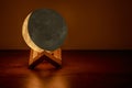 Eclipsed moon lamp on the table