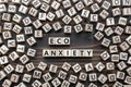 Eco-anxiety phrase from wooden blocks with letters