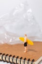Eco Awareness Concept with Mini Surfer Royalty Free Stock Photo