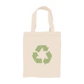 Fabric beige eco bag with a green recycling symbol Royalty Free Stock Photo