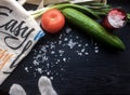 Eco bag with fresh vegetables and cats paws