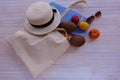 Eco bag with fruit, hat and sunglasses