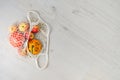 Eco bag with products on white background. Organic vegetables coming out from eco shopping bag