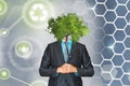 ECO Businessman. Have a good idea. Businessman with a tree per head. Ecology, business and finance concept