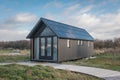 Eco cabin with solar panels, in a nature setting