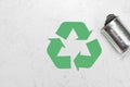 Eco concept. Waste recycling symbol with garbage on stone