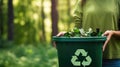 Eco-Consciousness Recycling Symbol on Green Trash Container Royalty Free Stock Photo