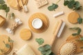 Eco cosmetics concept. Top view photo of bamboo foot brush and pumice cream jar soap dental floss toothbrushes hair brush cotton