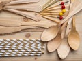 Eco, environment friendly disposable cutlery made from bamboo on wooden rustic background, top view Royalty Free Stock Photo