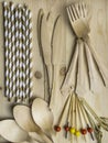 Eco, environment friendly disposable cutlery made from bamboo on wooden rustic background, top view Royalty Free Stock Photo